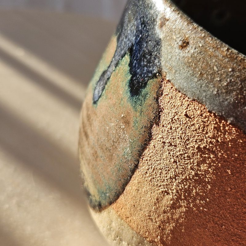 Close-up of a layered ceramic glaze